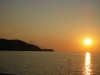 tn_02-sunrise-with-the-third-finger-poking-over-the-middle-finger-of-greece